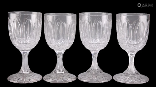 A SET OF FOUR VICTORIAN CUT GLASS WINE GLASSES, the bucket b...