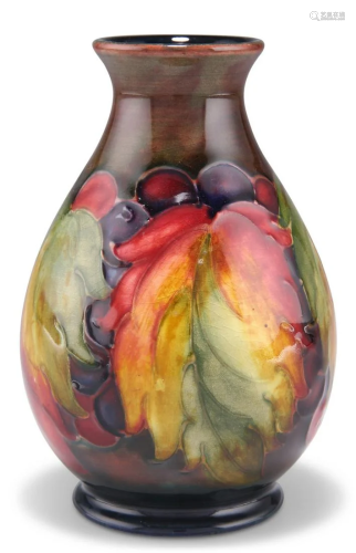 A WILLIAM MOORCROFT FLAMBÃ‰ POTTERY VASE, baluster form with...