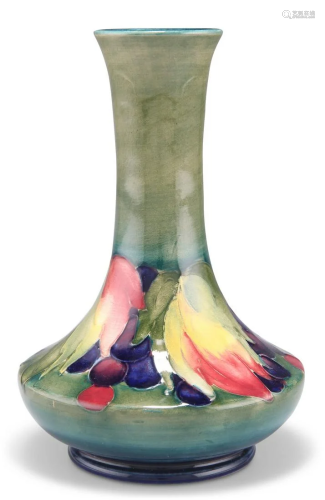 A WALTER MOORCROFT POTTERY VASE, squat baluster form with a ...