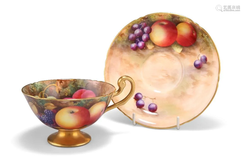 A ROYAL WORCESTER FRUIT PAINTED CUP AND SAUCER, the cup pain...