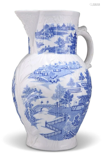 A LARGE 18TH CENTURY ENGLISH BLUE AND WHITE CABBAGE LEAF JUG...