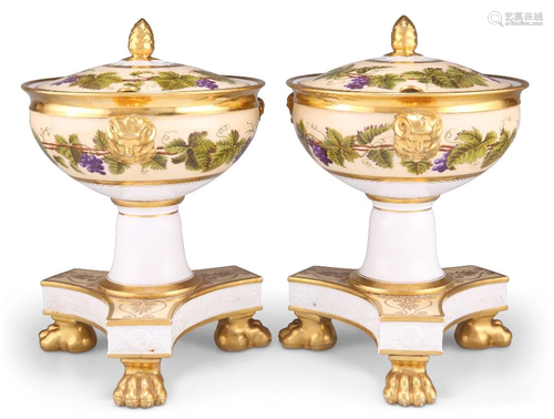 A PAIR OF EARLY 19TH CENTURY ENGLISH PORCELAIN PEDESTAL TURE...