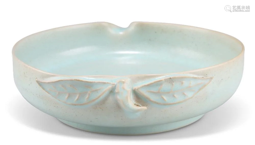 A CHINESE CELADON PEACH-FORM DISH, moulded with stork and le...