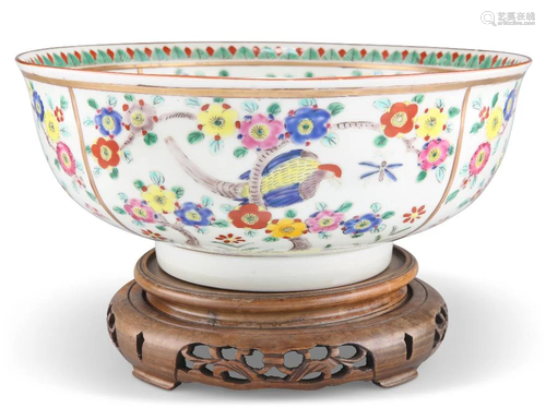 A CHINESE PORCELAIN BOWL, painted and gilded to the well and...