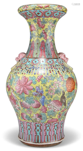 A CHINESE FAMILLE ROSE VASE, baluster form with a trumpet ne...