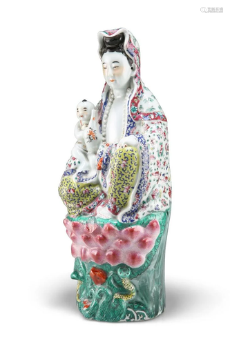 A CHINESE FAMILLE ROSE FIGURE OF GUANYIN, probably late 19th...