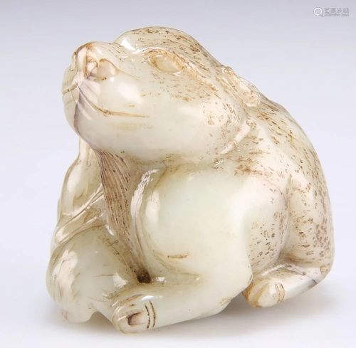 A CHINESE JADE ANIMAL GROUP, carved depicting an adult and y...