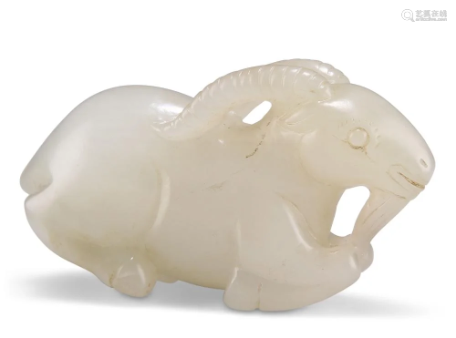 A CHINESE JADE CARVING OF A RAM, in a recumbent pose. 4.5cm ...