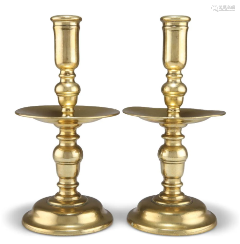 A LARGE PAIR OF HEEMSKIRK BRASS CANDLESTICKS, with baluster ...