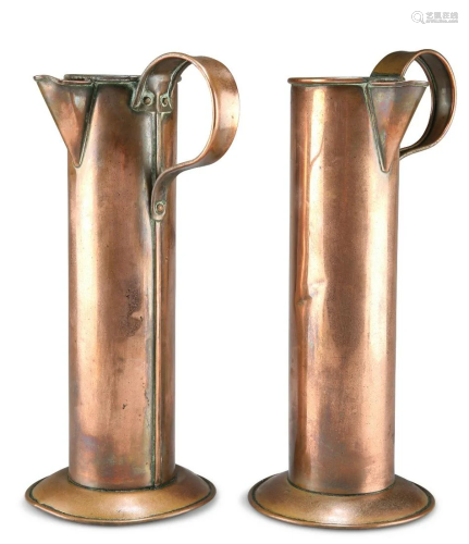 A PAIR OF COPPER MEASURES, cylindrical, each with strap hand...
