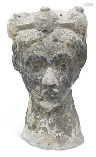 A RECONSTITUTED STONE SCULPTURE OF A CROWNED FEMALE HEAD, pu...