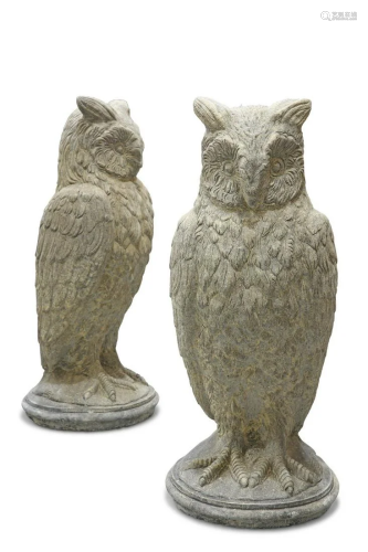 A PAIR OF RECONSTITUTED STONE LONG-EARED OWLS, each standing...