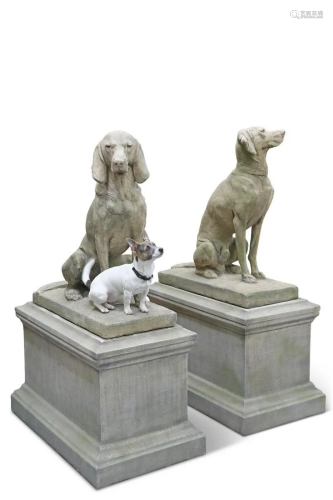 TWO LARGE RECONSTITUTED STONE DOGS, both seated, on rectangu...