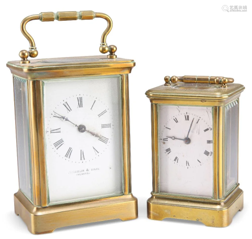 A BRASS CASED CARRIAGE CLOCK, the white enamel dial with Rom...