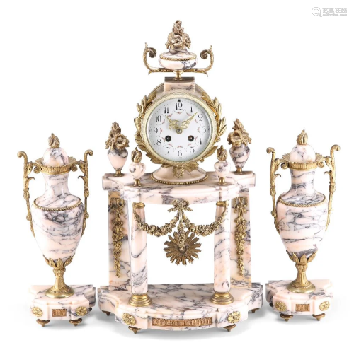 A 19TH CENTURY PINK VEINED MARBLE AND GILT BRASS CLOCK GARNI...