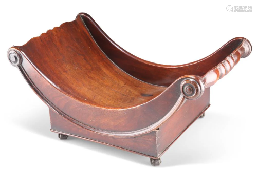 A REGENCY MAHOGANY CHEESE COASTER, with twin baluster lifts ...