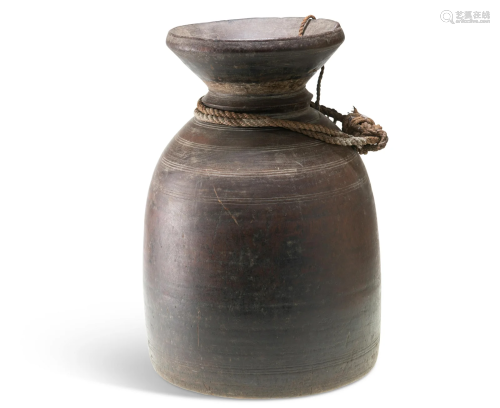 A NEPALESE GHEE TSAMPA TEKI WOOD POT, of conical form with a...