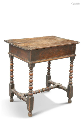 AN 18TH CENTURY OAK SIDE TABLE, with planked box top, raised...