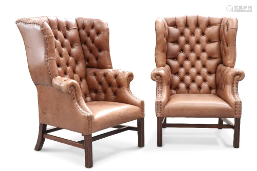 A GOOD PAIR OF DEEP-BUTTONED BROWN LEATHER WING-BACK LIBRARY...