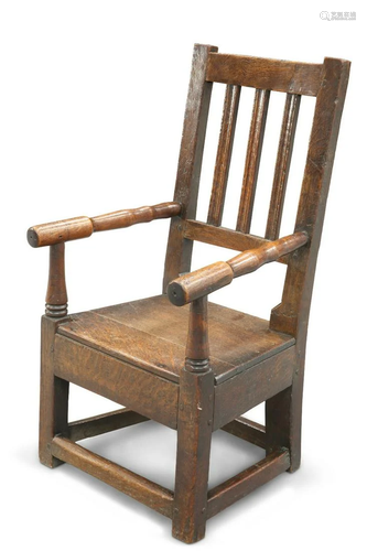 AN OAK CHILD'S ELBOW CHAIR, CIRCA 1800, with plank seat...