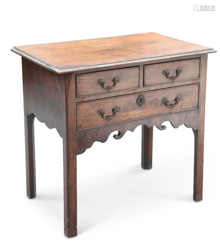 A GEORGE III MAHOGANY LOWBOY, the moulded rectangular top ab...