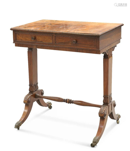 A REGENCY ROSEWOOD SIDE TABLE, the rectangular top with reel...