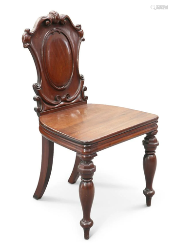 A MID-19TH CENTURY MAHOGANY HALL CHAIR, with C-scroll carved...