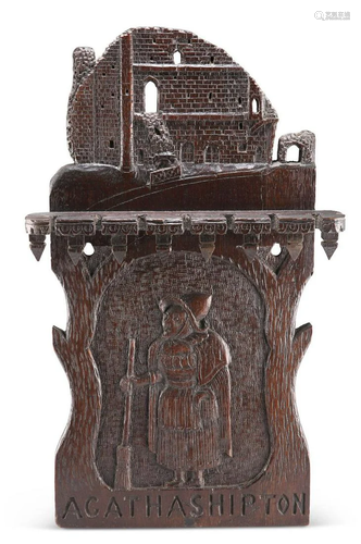 A CARVED OAK SPOON RACK, carved with Knaresborough Castle an...