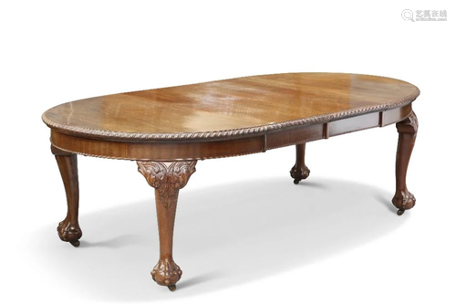 A VICTORIAN MAHOGANY CHIPPENDALE-STYLE WIND-OUT DINING TABLE...