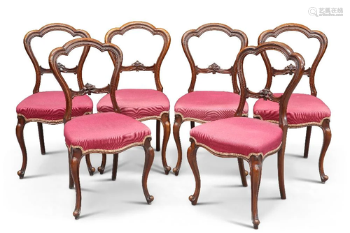 A SET OF SIX VICTORIAN WALNUT BALLOON-BACK DINING CHAIRS, CI...