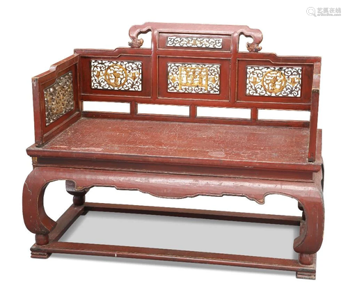 A CHINESE RED LACQUERED BENCH, with gilded fret-carved figur...