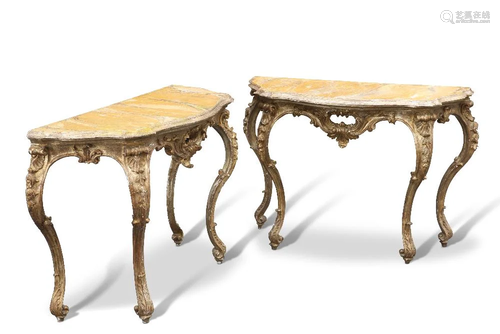 A PAIR OF CONTINENTAL GILTWOOD AND FAUX MARBLE CONSOLE TABLE...