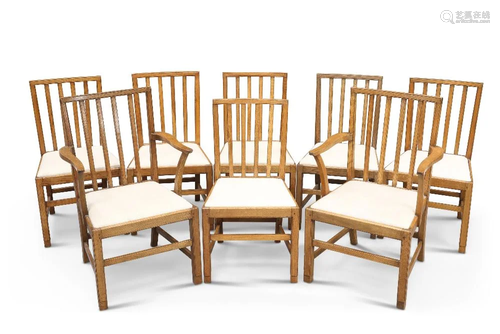 A SET OF EIGHT OAK DINING CHAIRS, ATTRIBUTED TO EDWARD BARNS...