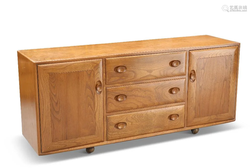 AN ERCOL LIGHT ELM SIDEBOARD, with a pair of cupboard doors ...