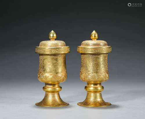 A Pair Of Gilt Silver Figure Cups