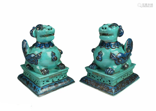 A Pair of Porcelain Mythical Beast Figurines