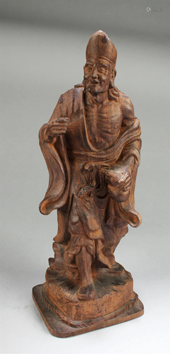 A Chinese Wooden Carved Immortal Statue