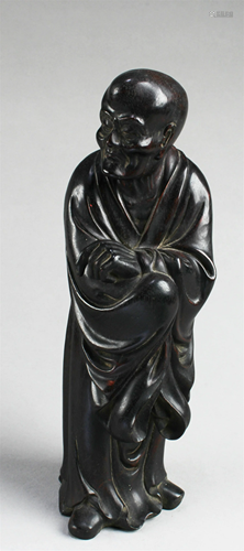 A Carved Hardwood Statue