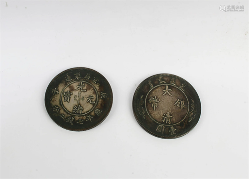 A Group of Two Chinese Silver Coins