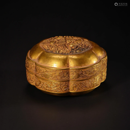 A Gold Hexagonal Shaped Box