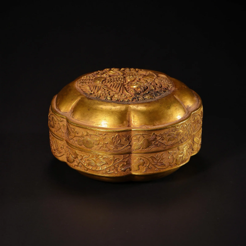 A Gold Hexagonal Shaped Box