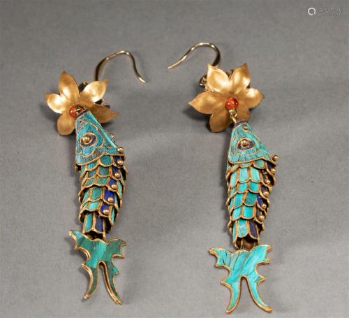 A Pair of Fish Shaped Gold Earrings