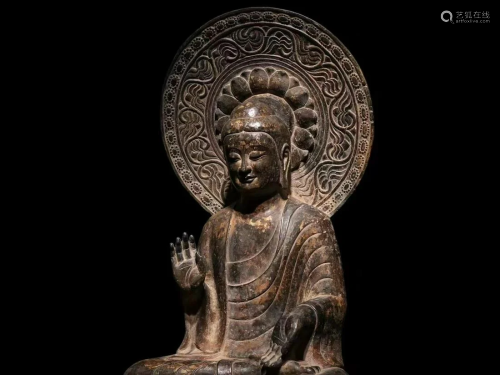 A Carved Stoen Buddha Statue