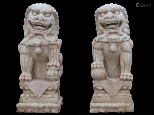 A Pair of Stone Foo Lion Statues