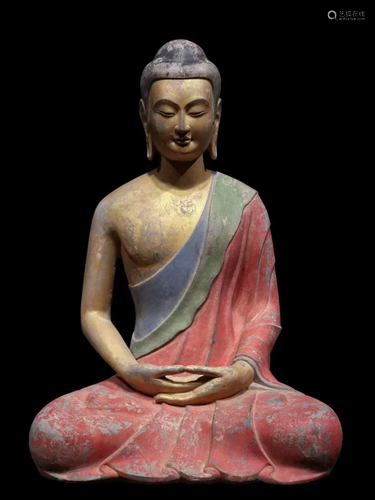 A Carved Stone Buddha Statue