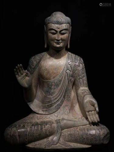 A Carved Stone Buddha Statue