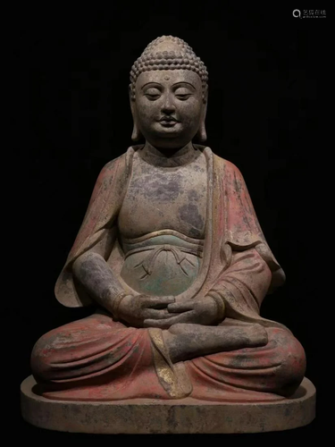 A Carved Stone Buddha Statue