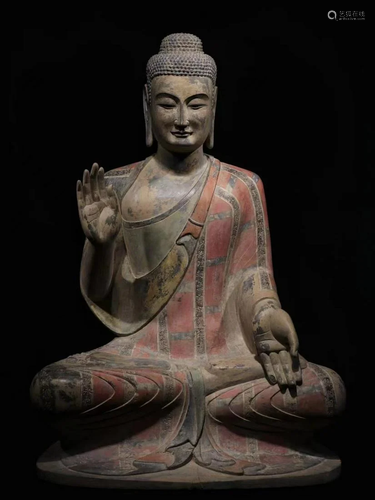 A Carved Stone Buddha Statue