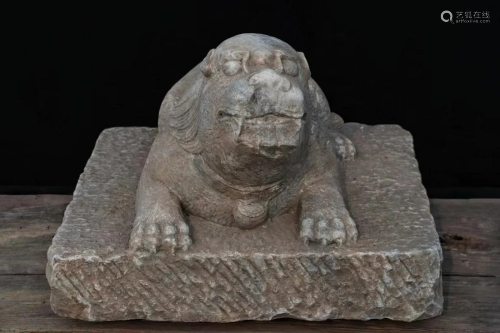 A Carved Stone Mythical Beast Statue