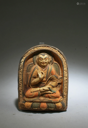 A Clay Buddha Statue